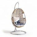 Hangstoel van rieten materiaal met kussen in blauw en beige 100 x 80 x 130cm